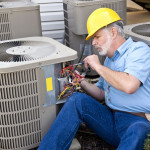 man repairing an air conditioner.jpg