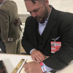 Eric Couch @ NYSE signing book_6-19.jpeg