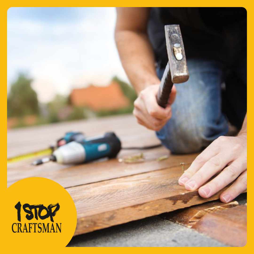 Hammering a nail into a wooden plank