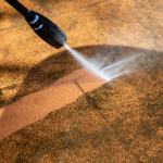 washing-the-backyard-tiles-with-high-pressure-clea-2022-11-15-14-04-05-utc-scaled.jpg