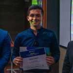 Feras Mousilli with the first-place winner of University Tecnologico de Antioquia's first-ever startup pitch competition