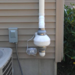 radon mitigation system near hvac compressor.jpg