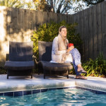 woman-sitting-on-sun-lounger-by-a-swimming-pool-2023-11-27-05-25-00-utc Medium.jpeg