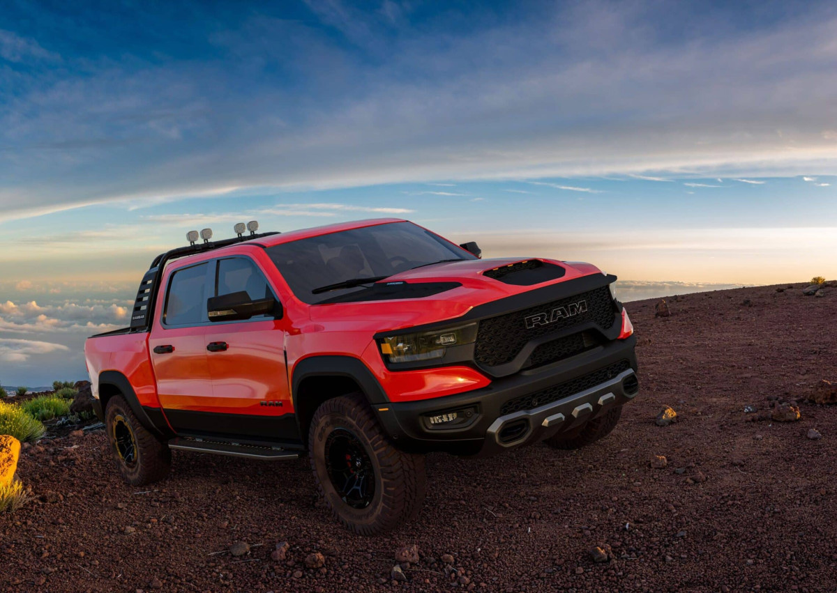 Lifted RAM 2500 truck with upgraded suspension driving through St. Louis