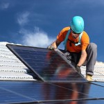 plumber installing solar geyser.jpg