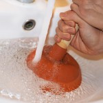 unclogging blocked drain.jpg