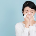 Woman blowing her nose.jpg