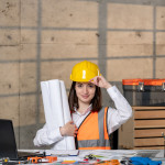 engineer-helmet-vest-civil-worker-smart-young-cute-brunette-girl-confident-min (1).jpg