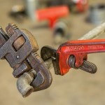 fixing pipe with a wrench.jpg