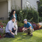 Termite_technician_with_home_owners.jpg