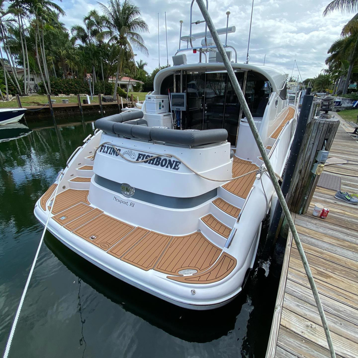 Boat flooring installation in progress showing clean deck prep and precision-cut EVA foam being applied