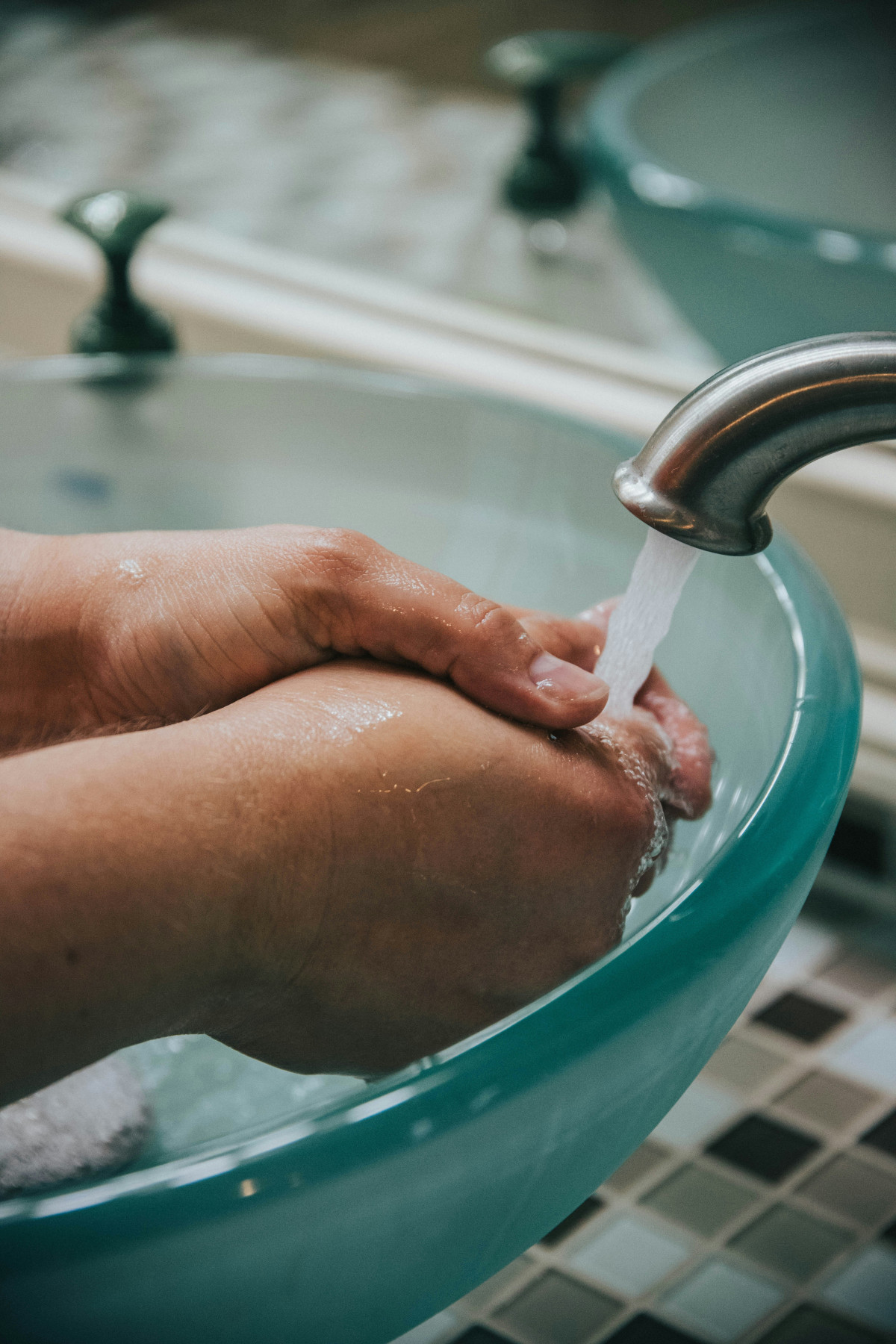 washing hands in warm water