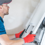 Technician-Replacing-Furnace.png
