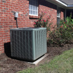 Home HVAC Unit next to modern brick home.jpg