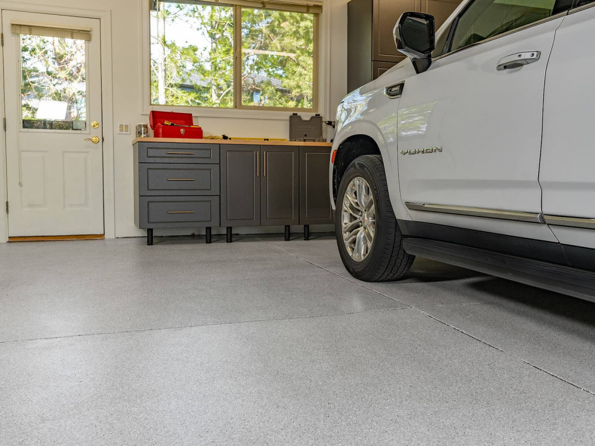 Coating Over Old Epoxy? Why It Fails (And Fixes)