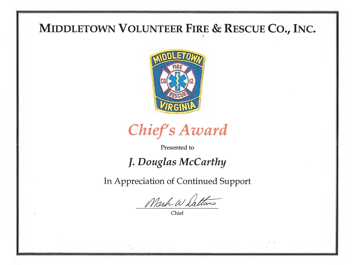 Doug_McCarthy_Presented_with_Chief’s_Award_by_Middletown_Volunteer_Fire_&_Rescue.png
