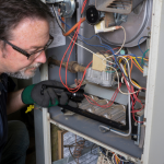 Technician working on Furnace.png