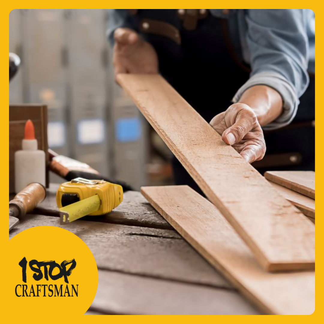 Handyman working with wooden planks and tools on a workbench