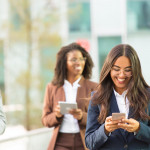 happy-latin-office-employee-texting-message-min-min.jpg