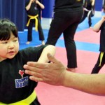 kid hook punch Empower Kickboxing .jpg
