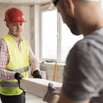 close-up-men-working-with-helmets-min.jpg